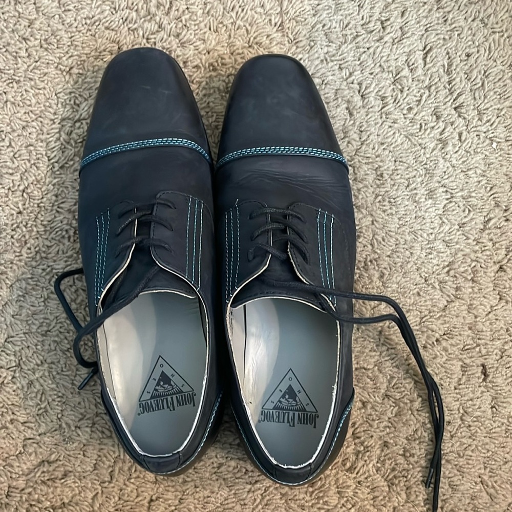 Like new super comfortable black with blue stitching size 10
